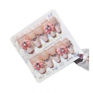 Pink French Tip with Glitter Accents and Heart & Butterfly Designs - Image 3